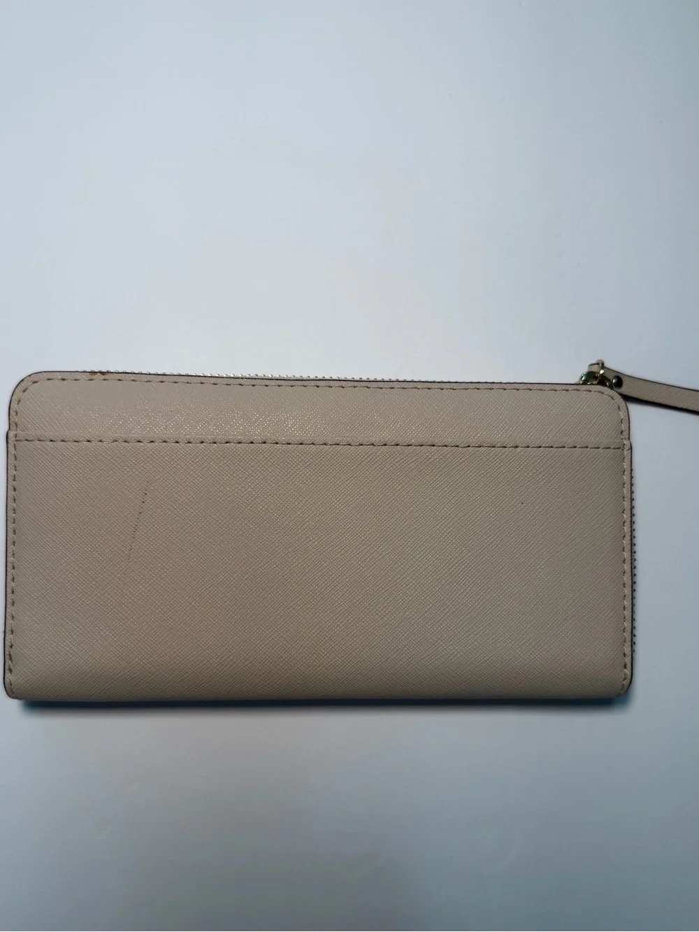 kate spade beige Minnie Mouse zip-around wallet